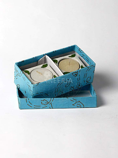 Turquoise Flower With Green Leaves on White Base